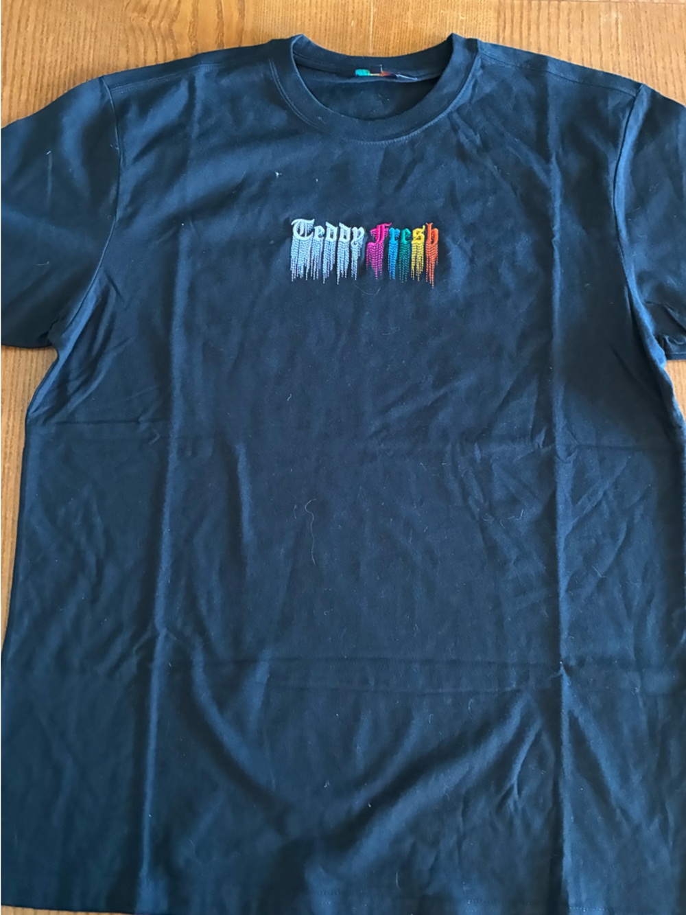 Teddy Fresh Men’s Black Crewneck T-Shirt with Rainbow Drip Logo
